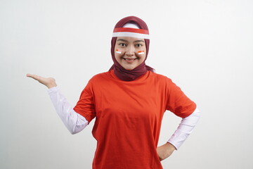 Woman pointing with hand - indonesian independence day concept
