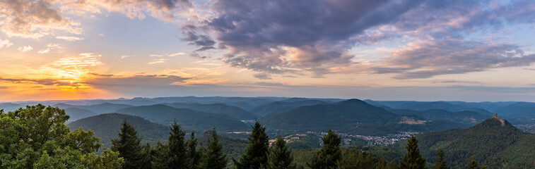 Fototapeta na wymiar Panorama of Palatinate Forest during Sunset with Trifels Castle seen from Rehbergturm, Rhineland-Palatinate, Germany, Europe