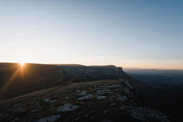 last sunbeam before sunset from Tologorri peak in Gorobel mountain range