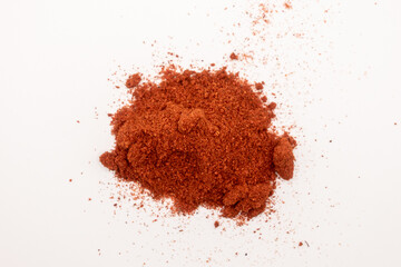 Paprika powder isolated on white 
