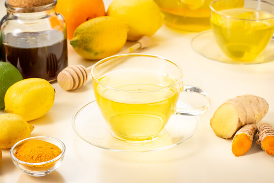 Ginger turmeric tea with honey, and fresh lemon. Natural herbal infusion for cold and immunity. Hot Cup of tea.