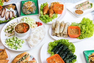 Assorted asian dinner, vietnamese food. Pho ga, pho bo, noodles, spring rolls, Nham due