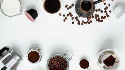 Ingredients for making coffee. Different ways to make coffee geyser moka maker,  metal cezve, coffee machine capsules, drip. Coffee making concept. Flat Lay. Top view. Copy space