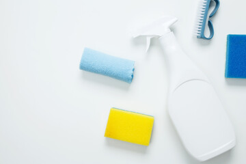 Various accessories cleaning products, sprays, rags, sponges and brushes. Top view, flat lay, copy space
