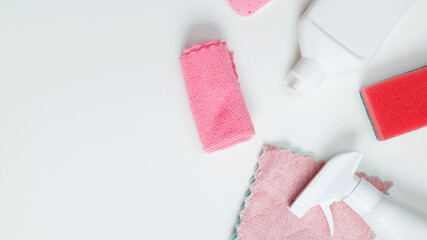 Various accessories cleaning products, sprays, rags, sponges and brushes. Top view, flat lay, copy space