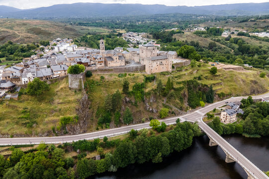 Aerial view of Puebla de Sanabria, a small town with a medieval castle along the Rio Tera river in Zamora, Spain.