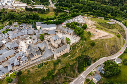 Aerial view of Puebla de Sanabria, a small town with a medieval castle along the Rio Tera river in Zamora, Spain.