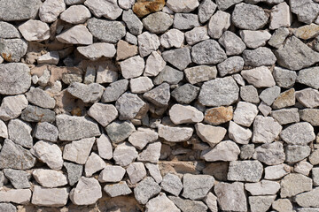 The walls are made of stones of various sizes.