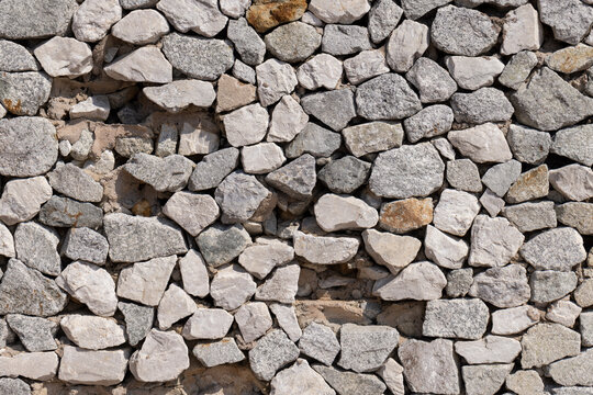 The walls are made of stones of various sizes.