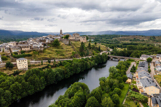 Aerial view of Puebla de Sanabria, a small town with a medieval castle along the Rio Tera river in Zamora, Spain.