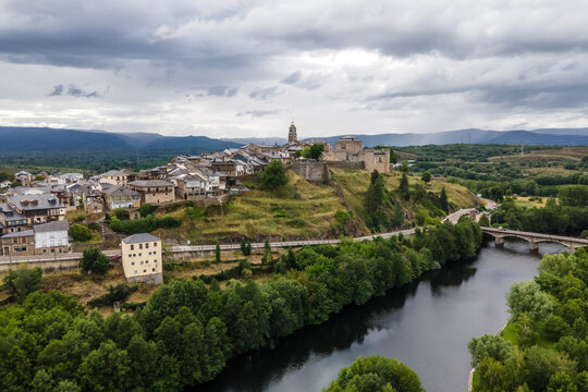 Aerial view of Puebla de Sanabria, a small town with a medieval castle along the Rio Tera river in Zamora, Spain.