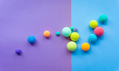 Colorful abstract figures made of plasticine, Balls of different sizes. Funny illustration for the background of children's holidays, frame for text.