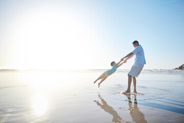Family, father and spinning a child at the beach for fun, adventure and play on holiday. A man and...