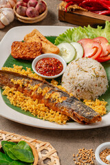 Fried Catfish (Indonesia : lele goreng) with sambal balado is Traditional Indonesian Culinary Food, Popular Street Food Called Pecel Lele Lamongan or Penyetan Lele.