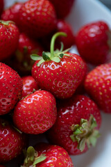 Organic ripe red strawberries macro close up