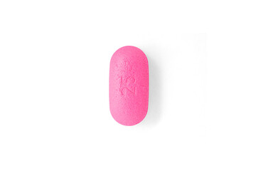 25mg Pink diphenhydramine allergy pill isolated on white background with shadow