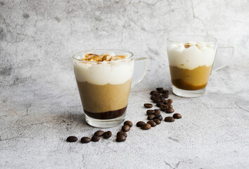 Coffee dessert. On a gray background.
Classic tiramisu in a cup