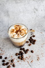 Coffee dessert. On a gray background.
Classic tiramisu in a cup