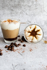 Coffee dessert. On a gray background.
Classic tiramisu in a cup