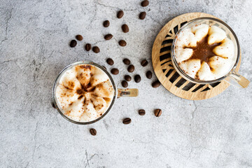 Coffee dessert. On a gray background.
Classic tiramisu in a cup