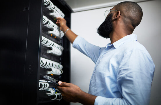 Server room, tablet and technician man with cable for internet connection for software programming. Engineer black person with tech for cybersecurity, hardware wire or maintenance in data center