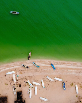Aerial view of boats on the beach along Kan Balam beach in Celestun, Yucatan, Mexico.