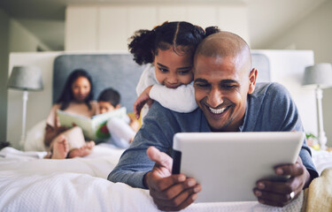Happy, cartoon and father and a child with a tablet in the bedroom for games, app or streaming a video. Smile, family and a dad and a little girl watching a film on tech for education on a house bed