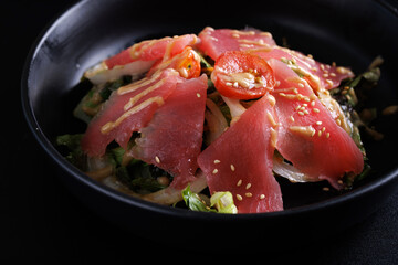 Japanese salad isolated in black background