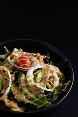 Japanese salad isolated in black background