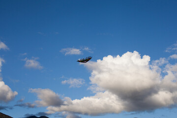 Photograph of colorful comet in the blue sky. Concept of objects and entertainment. © artrolopzimages