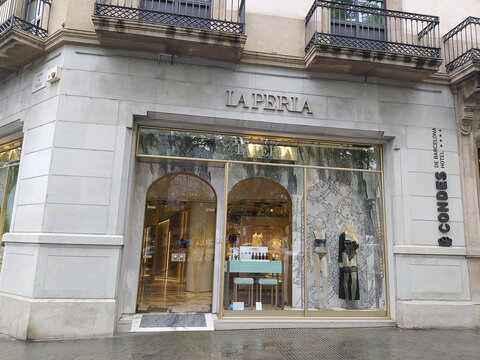 Barcelona, Spain - May 25, 2023: La Perla brand logo and text sign facade street at Barcelona, Spain