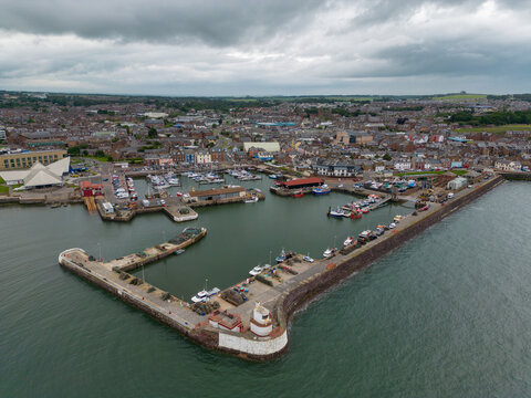 Aerial drone photo of the harbour and town of Arbroath in Scotland