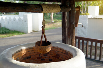 An ancient well or winch to fetch water from a well is built using simple physics mechanics of...