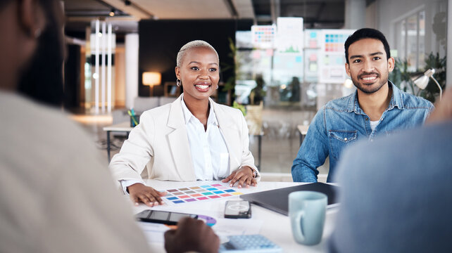 Meeting, discussion and business people planning a creative project at a startup design office. Talk, brainstorming and team of designers talking and working on artistic ideas for strategy in a group