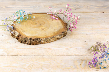 Blooming Nature: Pine Table, Delicate Baby's Breath Flowers, and Birch Board