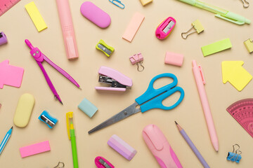 Flat lay with colorful school stationery on color backgroung, top view