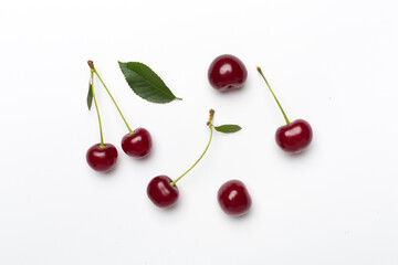 Obraz na płótnie Canvas Flat lay with fresh cherry on white backgroung, top view