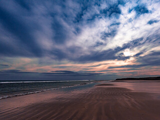 Obraz na płótnie Canvas El Cóndor beach at sunset