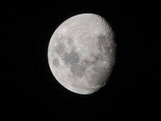 Waning gibbous moon with dark background