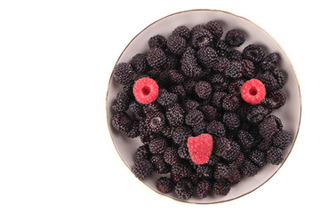 raspberry, black raspberry in a plate, isolate on white