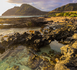 Sea Arch and The Volcanic Shoreline of Makapu'u Beach With Makapu'u Point In The Distance, Oahu, Hawaii, USA