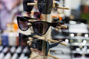 A large selection of various sunglasses.