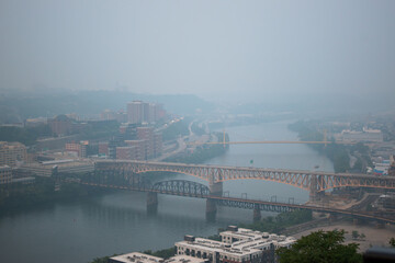 View of Monongahela River with poor air quality and haze caused by the Canadian wildfire smoke,...