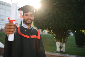 Indian university male student celebrating graduation