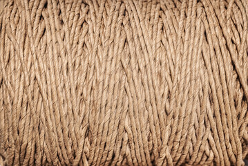 A skein of paper brown twine, background.