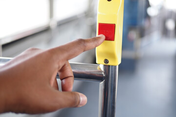 Closeup of Bus bell switch for stop inside the public bus