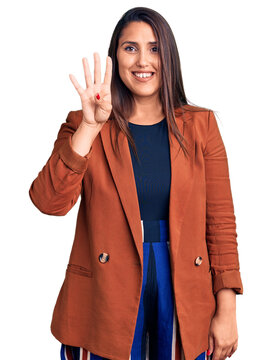 Young beautiful brunette woman wearing elegant clothes showing and pointing up with fingers number four while smiling confident and happy.