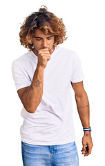 Fototapeta na wymiar Young hispanic man wearing casual white tshirt feeling unwell and coughing as symptom for cold or bronchitis. health care concept.