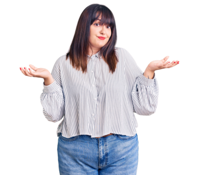 Young plus size woman wearing casual clothes clueless and confused expression with arms and hands raised. doubt concept.