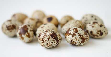 Fototapeta na wymiar quail eggs on white background